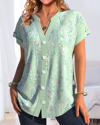 Buttoned, printed blouse with short sleeves