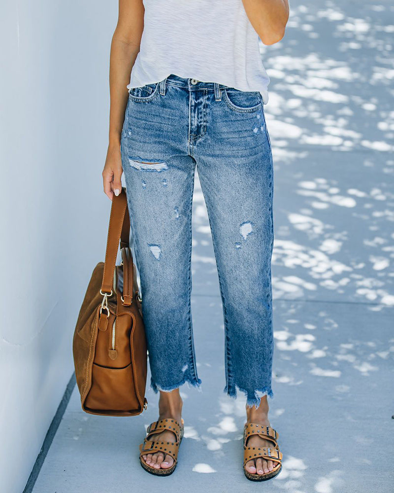 Cropped jeans with ripped straight legs