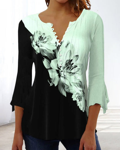 Top with 3/4 sleeves and floral print