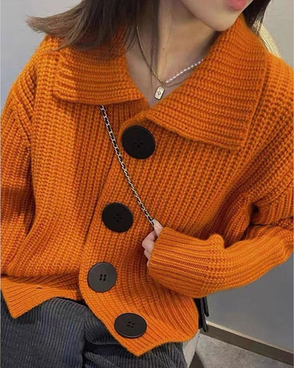 Cardigan with large buttons and knitted pattern