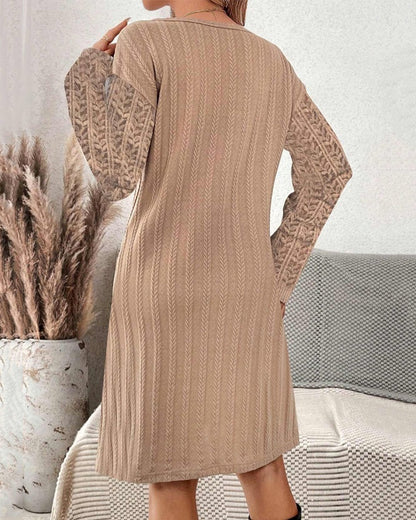 Dress with pleats and long sleeves