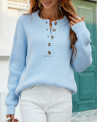 Solid color crew neck sweater with buttons