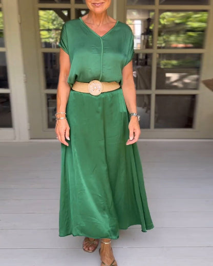 Green dress with elegant neckline (belt not included)