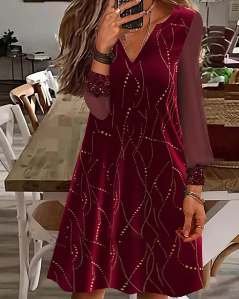 Loose, casual long-sleeved dress with a V-neck