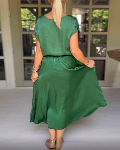 Green dress with elegant neckline (belt not included)