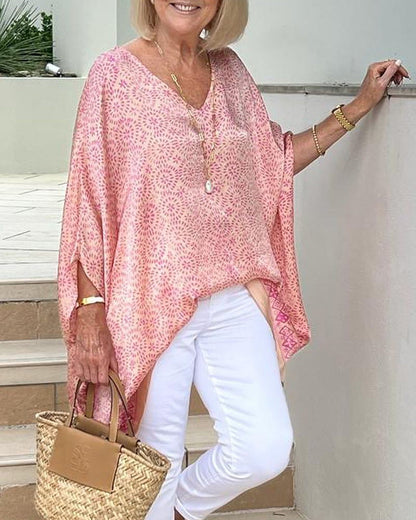 Loose blouse with print and dolman sleeves