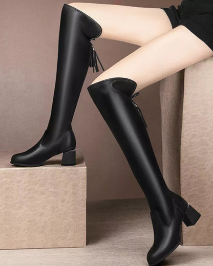 Over-the-knee boots made from stretch fleece with a chunky heel