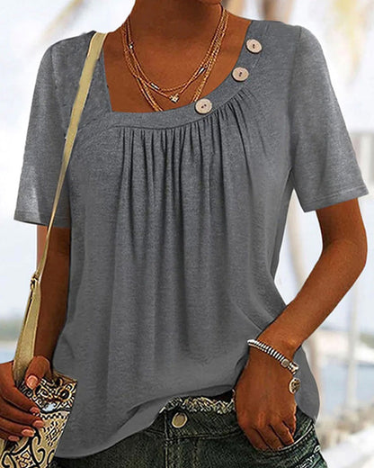 Gray blouse with decorative buttons