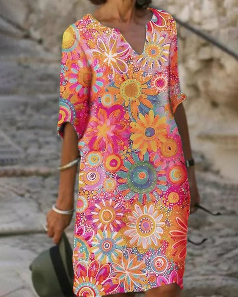 Printed dress with half sleeves and v-neck