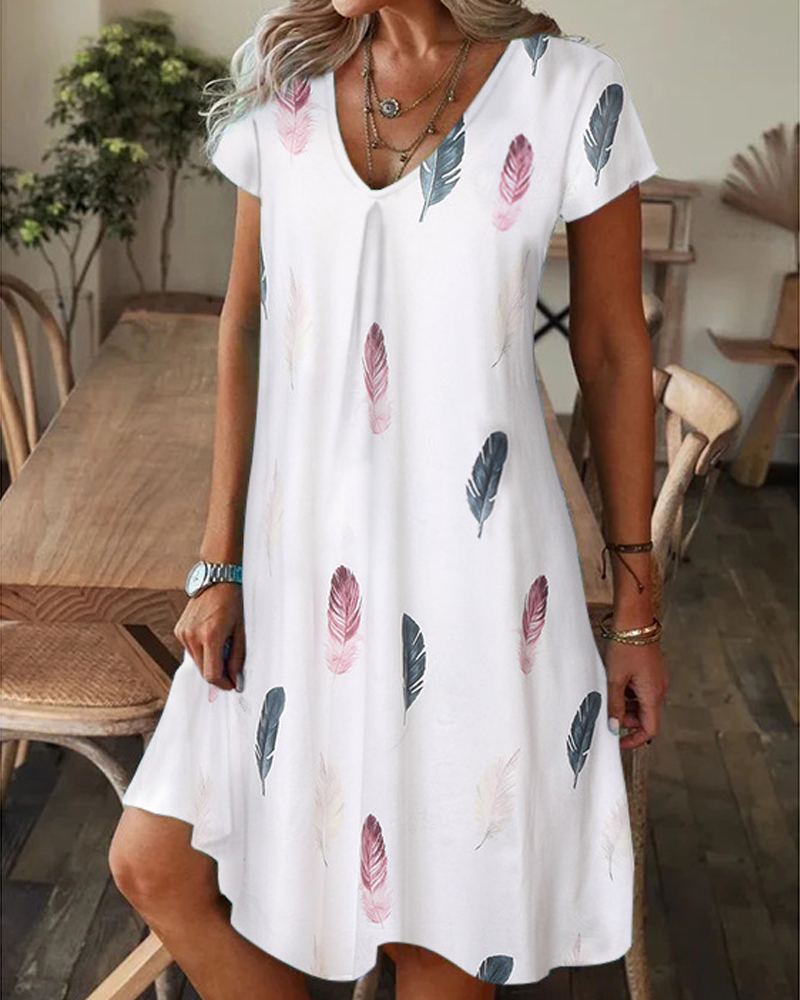 Short sleeve dress with feather and floral print