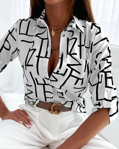 Elegant long-sleeved blouse with print