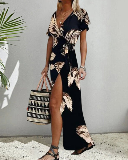 Printed dress with front slit and short sleeves