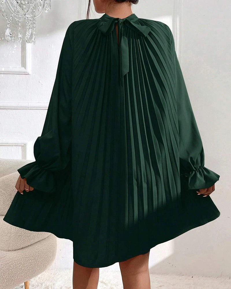 Dress with balloon sleeves and ruffles