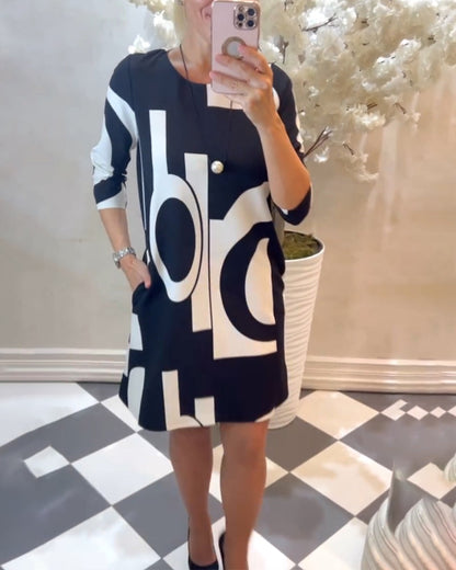 Printed dress with long sleeves
