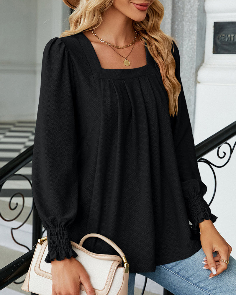 Solid color top with a square neckline