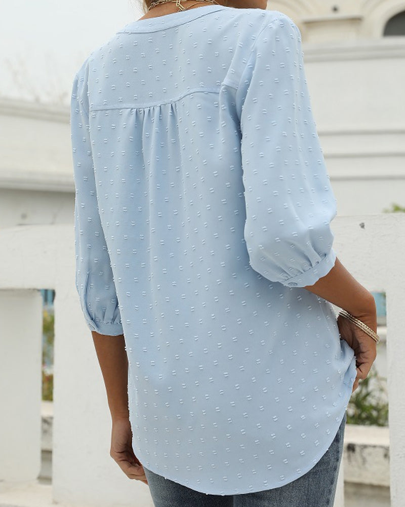 Shirt with a stand-up collar and medium-length sleeves