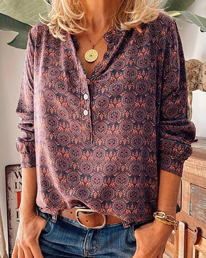 Long-sleeved blouse with a vintage print