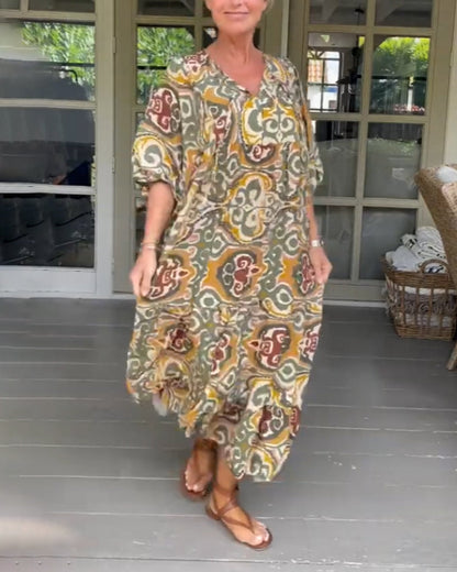 Maxi dress with print and V-neck