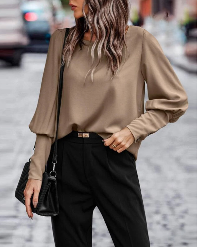 Plain blouse with lantern sleeves