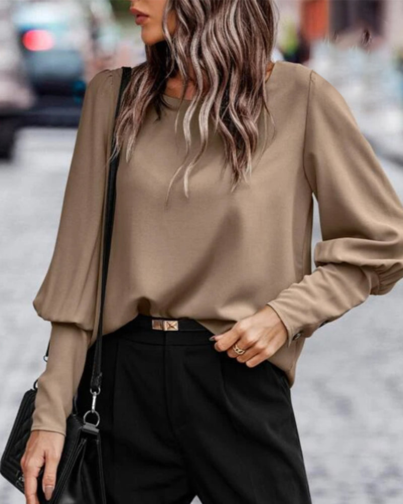 Plain blouse with lantern sleeves