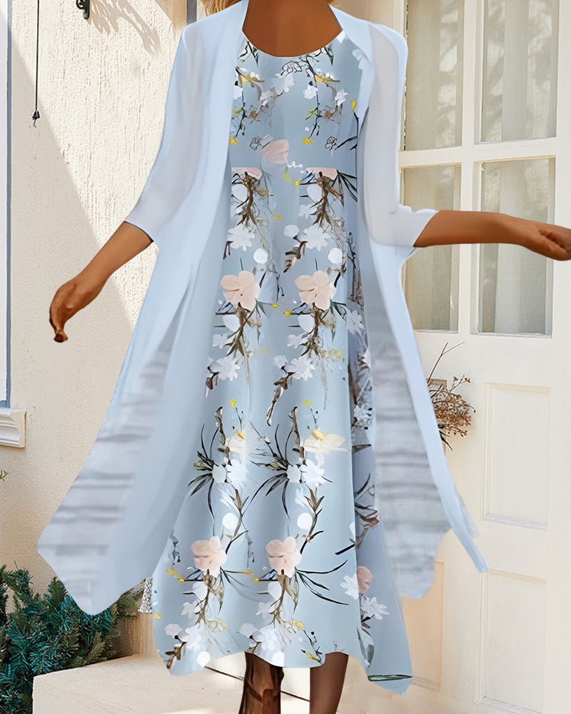 Loose dress with 3/4 sleeves and floral print
