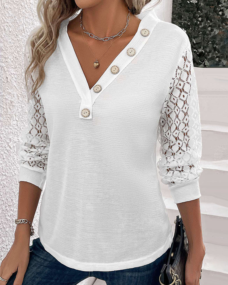 Plain colored top with lace sleeves