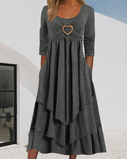 Midi dress with a round neckline and ruffles