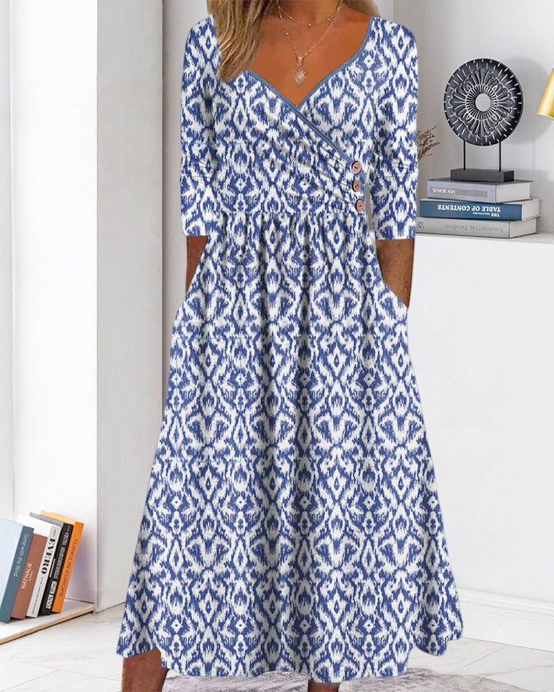 Dress with fashionable print and buttons and V-neck