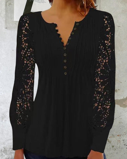 Long sleeve lace top with V-neck and floral pattern