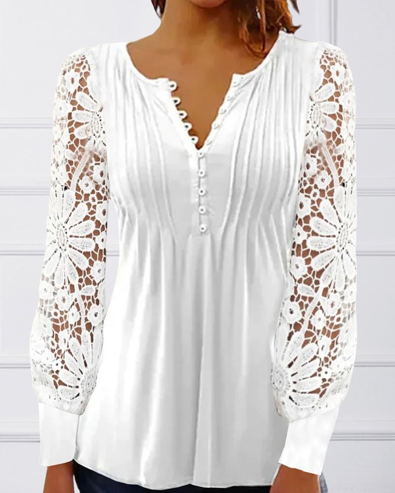 Long sleeve lace top with V-neck and floral pattern