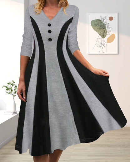 Knee-length dress with V-neck and button placket