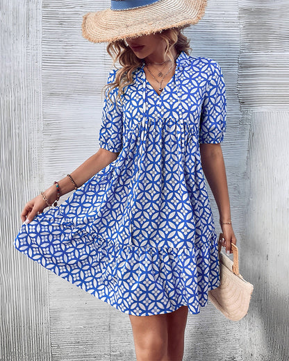 Dress with a fresh print and short sleeves