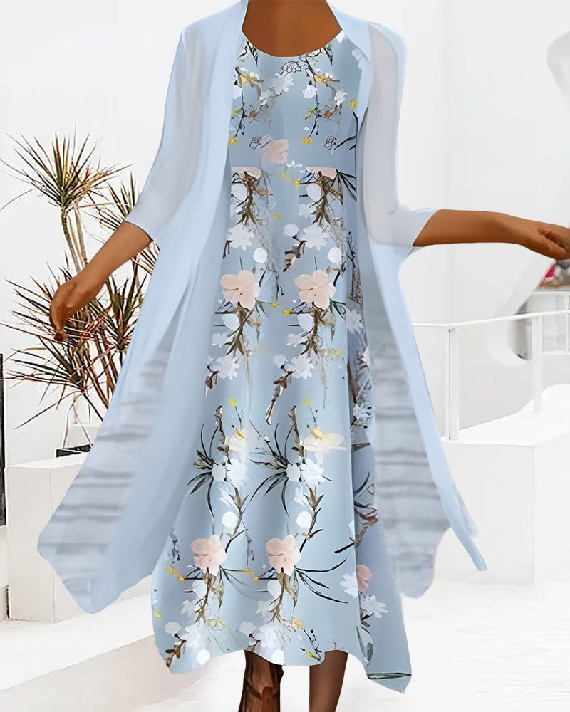 Loose dress with 3/4 sleeves and floral print