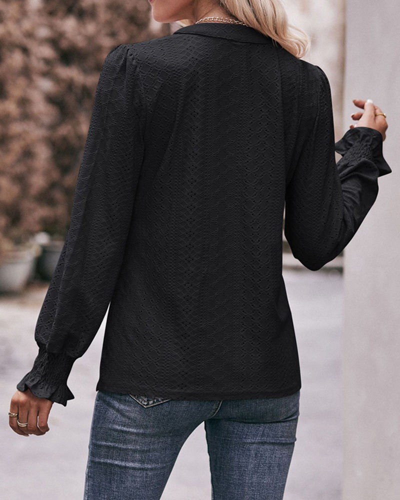 Solid color long sleeve top with a hollow out V-neck