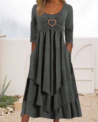Midi dress with a round neckline and ruffles