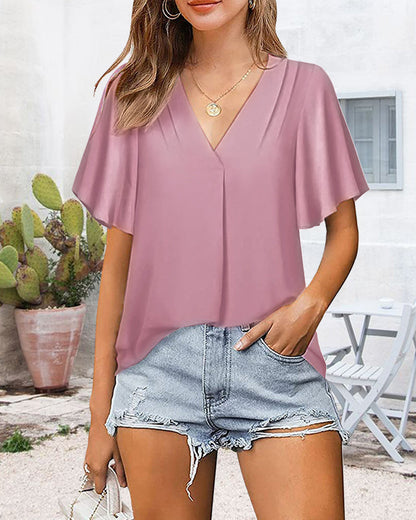 Loose pleated top with a V-neck