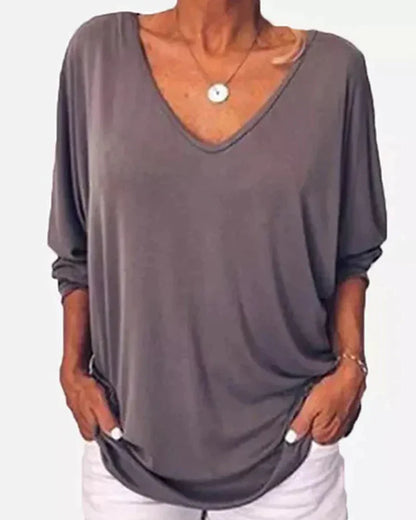 Top with 3/4 sleeves at the back and V-neck