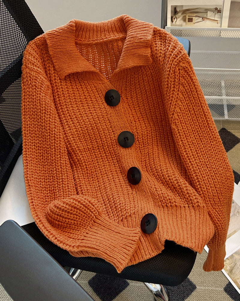 Cardigan with large buttons and knitted pattern