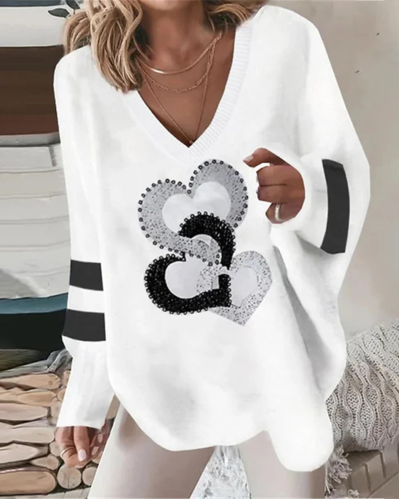 Casual long-sleeved top with a heart print