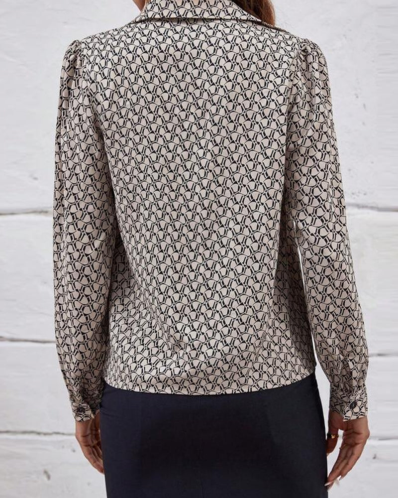 Elegant blouse with geometric printed lapels