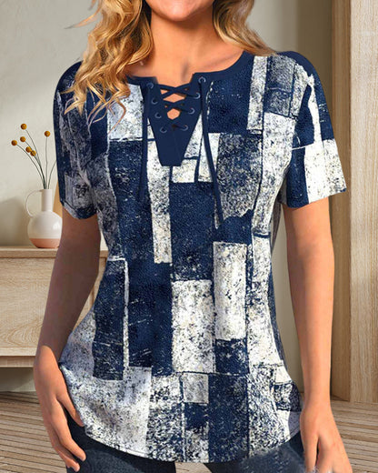 Blouse with geometric print and lacing