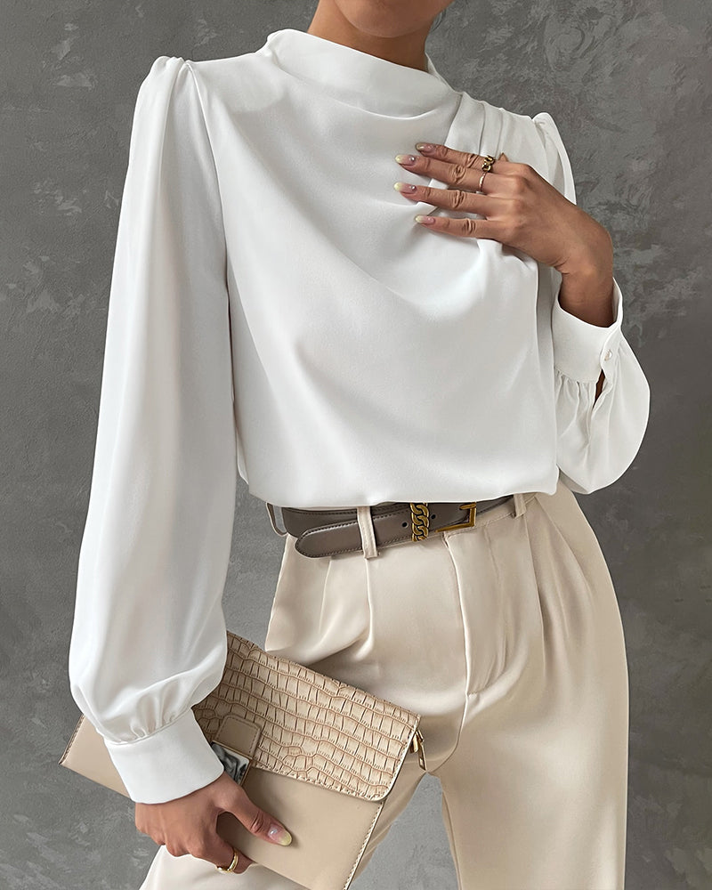 Solid-colored, ruffled blouse with a stand-up collar