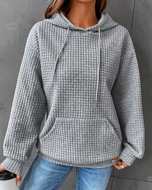 Solid color hooded sweatshirt with pockets