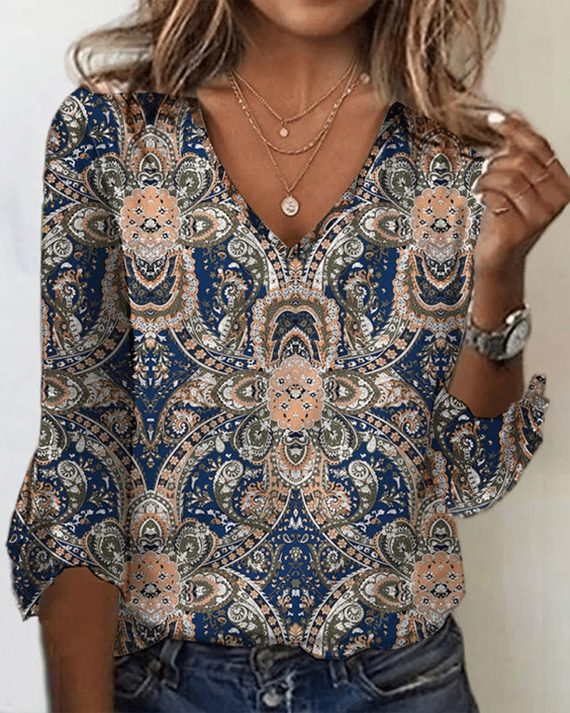 Printed top with 3/4 sleeves and V-neck
