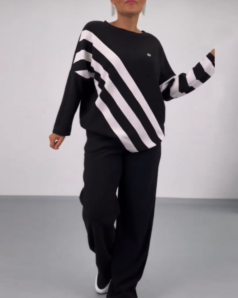 Loose sweatshirt with batwing sleeves and stripes