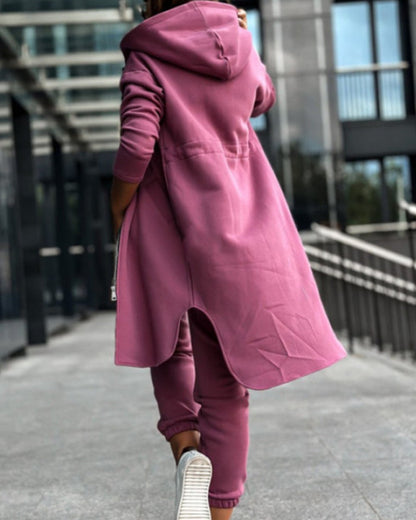 Two-piece set consisting of a plain coat and trousers