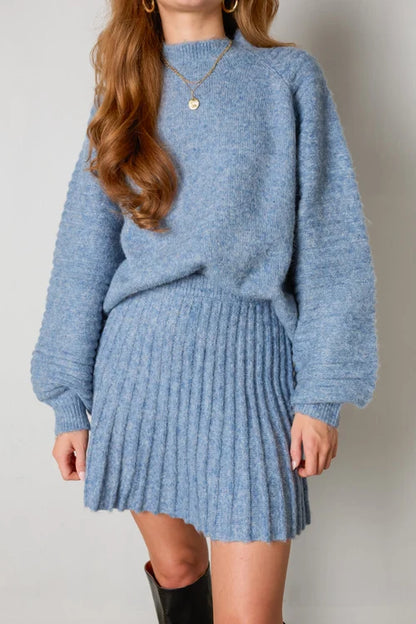 Elegant pleated sweater and skirt