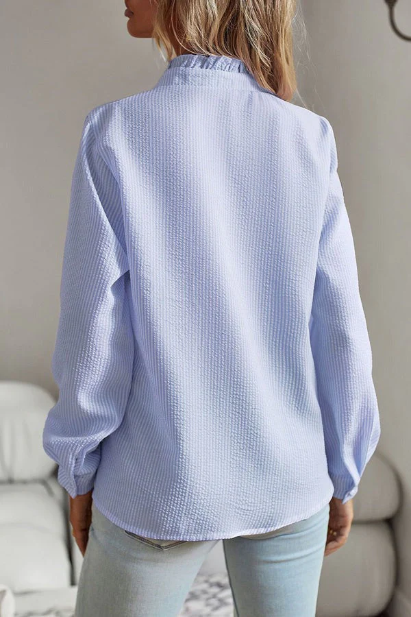 Blue long-sleeved shirt with print